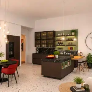 Progetto cucina con isola a Napoli in una villa, zona pranzo: il tavolo Eclipse tondo e sedie Sicla in polipropilene rosso.